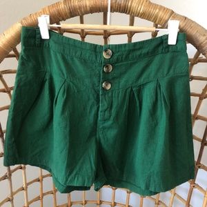 Me To We green shorts, size medium